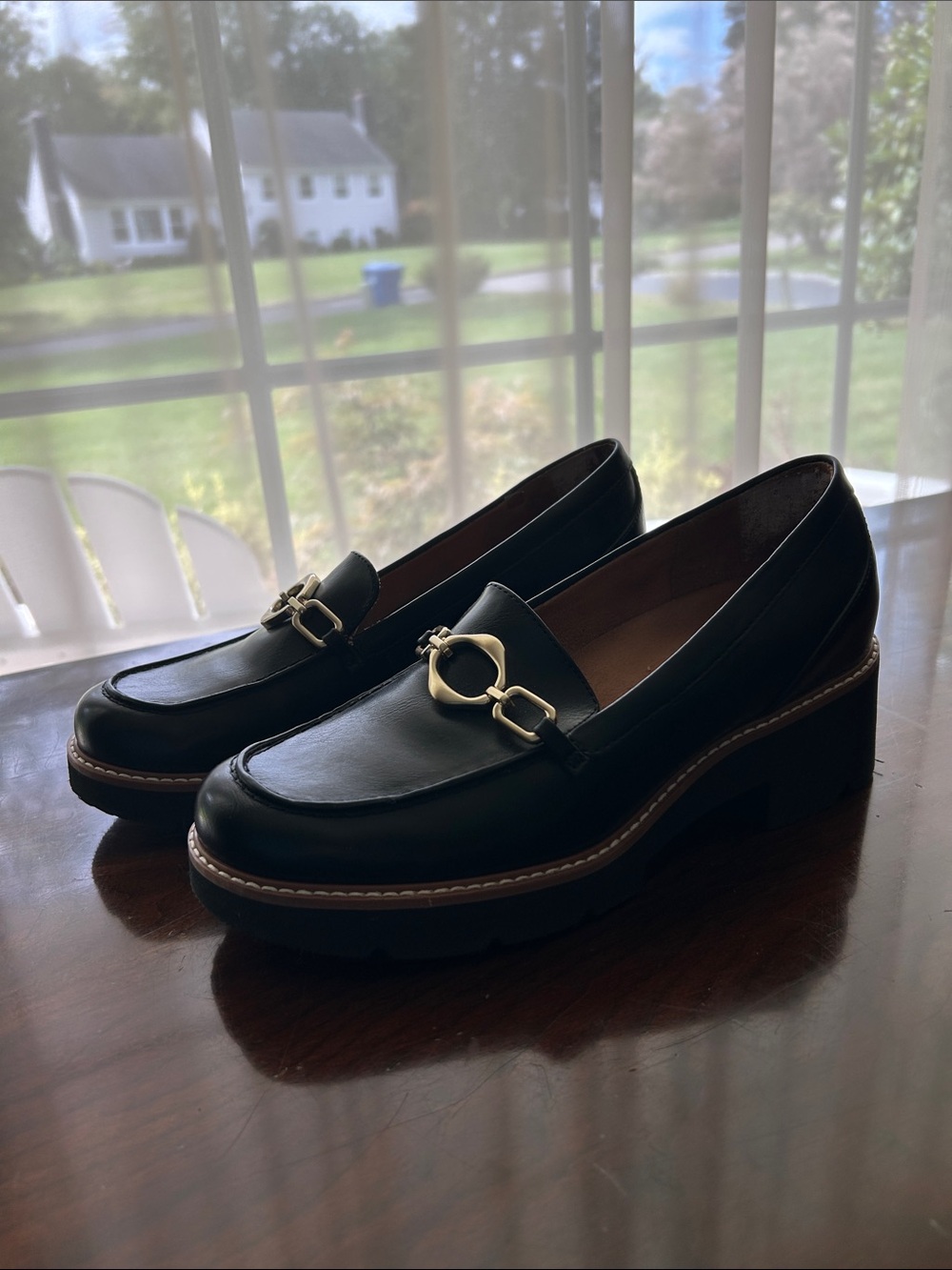 Classic Black Leather Loafers with Gold Hardware